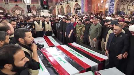 النجف.. تشييع عناصر الحشد الشعبي العراقي القتلى في...