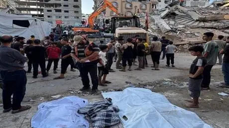 عشرات القتلى والجرحى والمفقودين بانهيار مبنى في غز...