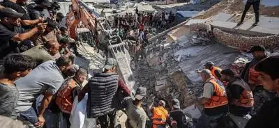 21 شهيداً بينهم 12 طفلاً بانهيار مبنى في غزة