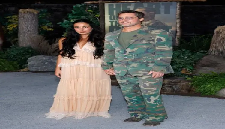 براد بيت ببدلة عسكرية وحبيبته بفستان دانتيل.. إطلا...